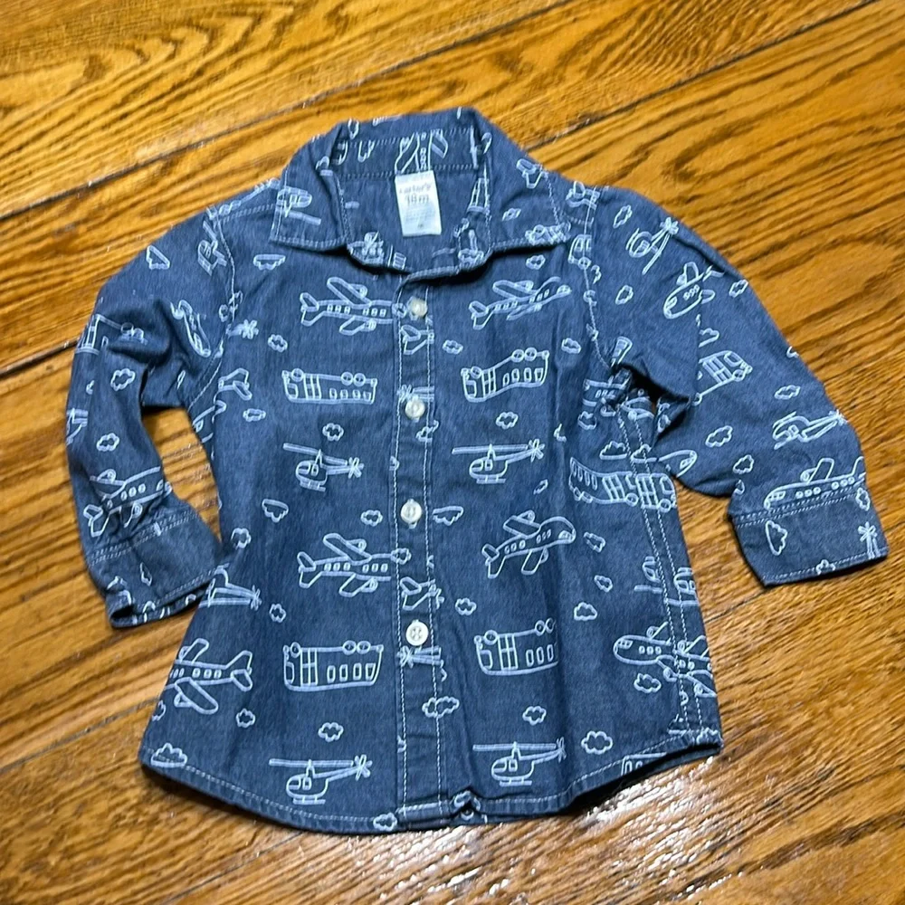 Carter’s blue and white long sleeve shirt. Excellent condition. Size 18 Months.